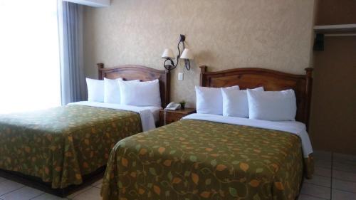 Foto de una habitación de Hotel La Vista