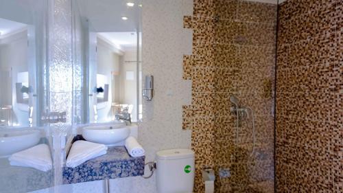 Foto del baño de Hotel Golden Flora