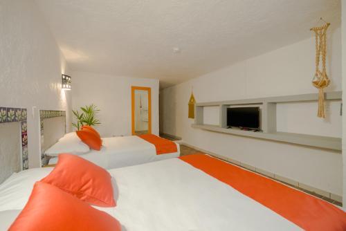 Foto de una habitación de Hotel Caracol Puerto