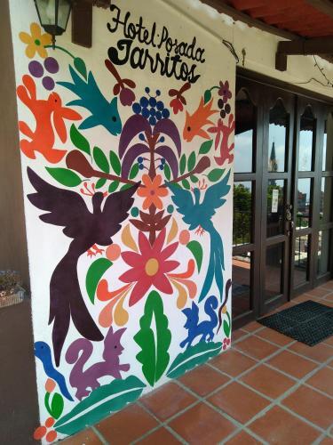 Foto de una habitación de Hotel Posada Jarritos