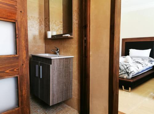 Foto del baño de AMWAJ HOTEL