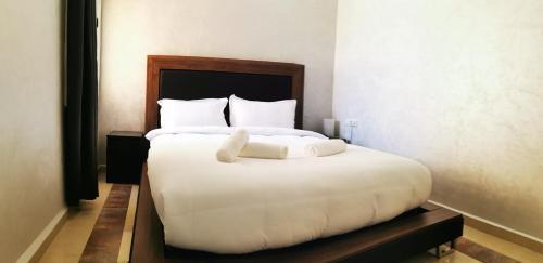 Foto de una habitación de AMWAJ HOTEL
