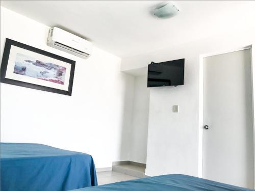 Foto de una habitación de Hotel Mona Inn