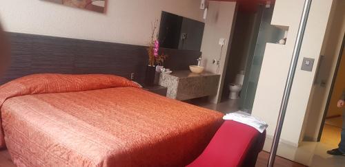 Foto de una habitación de Hotel y Villas Las Torres