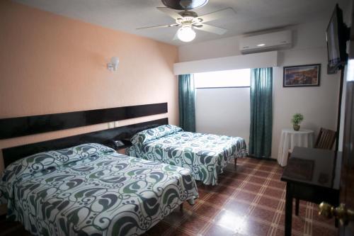 Foto de una habitación de Hotel Maria De Lourdes