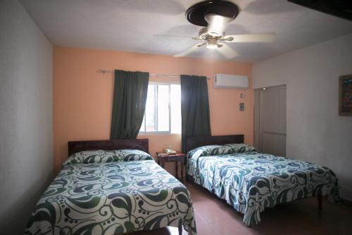 Foto de una habitación de Hotel Maria De Lourdes