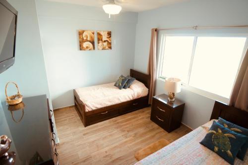 Foto de una habitación de Alquileres Vacacionales Maz4you Beachfront Condo