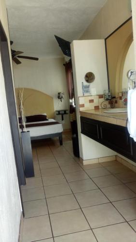 Foto de una habitación de Hotel Brambila
