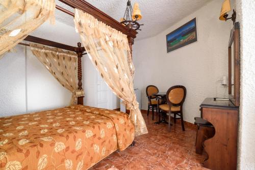 Foto de una habitación de Hotel Porto Perissa