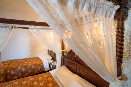 Foto de una habitación de Hotel Porto Perissa