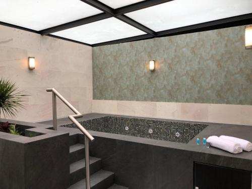 Foto del baño de Kaia Suites