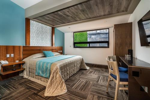 Foto de una habitación de Kaia Suites