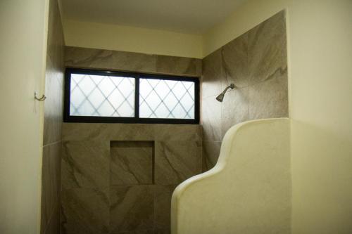 Foto del baño de Hotel Hacienda Izamal