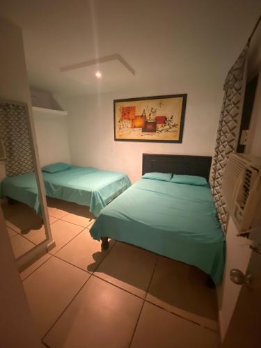Foto de una habitación de Albergue Departamentos Zona Dorada