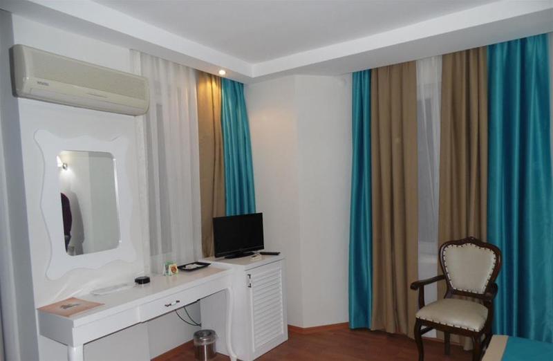 Foto de una habitación de Nasa Flora Hotel
