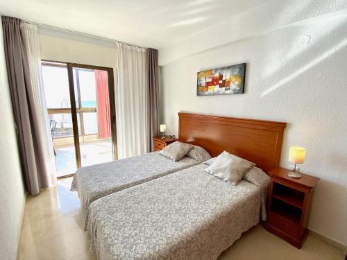 Foto de una habitación de Alquileres Vacacionales Los Gemelos 2- Aloturin Benidorm