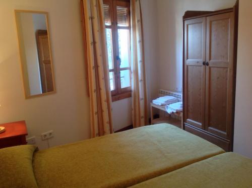 Foto de una habitación de Apartamentos Alojamientos Turísticos Casco Antiguo
