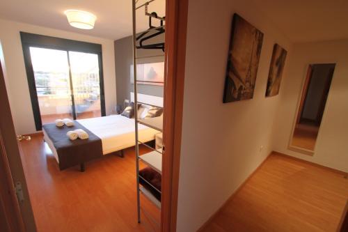 Foto de una habitación de Apartamentos For A Stay Las Dunas