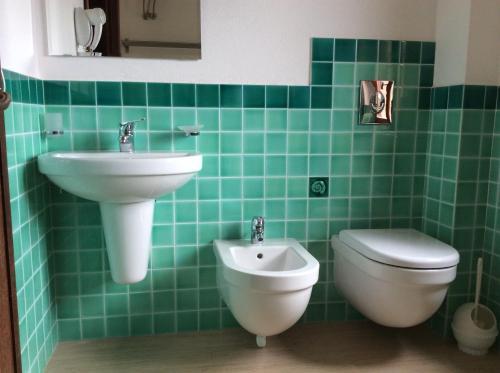 Foto del baño de Aparthotel La Contessa