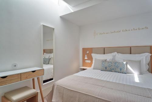 Foto del baño de Alojamento da Vila