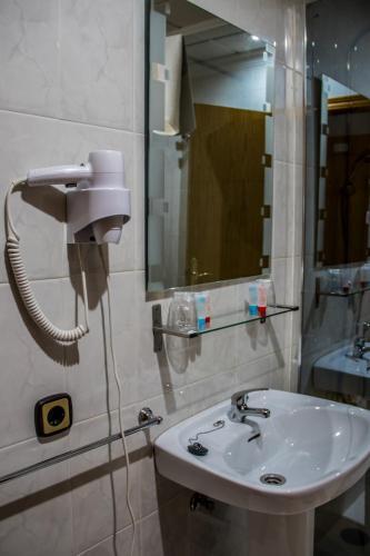 Foto del baño de HOSTAL VILLARICOS