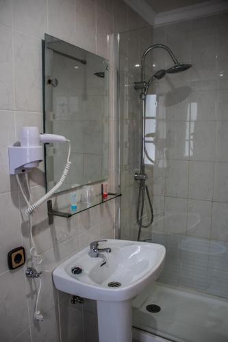 Foto del baño de HOSTAL VILLARICOS