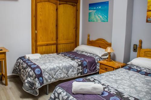 Foto de una habitación de HOSTAL VILLARICOS