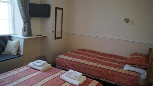 Foto de una habitación de Hampton Court Guesthouse