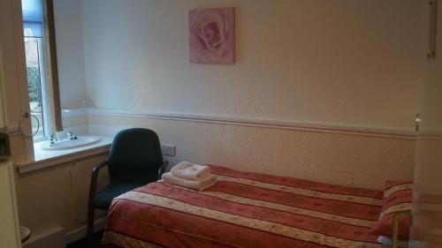 Foto de una habitación de Hampton Court Guesthouse