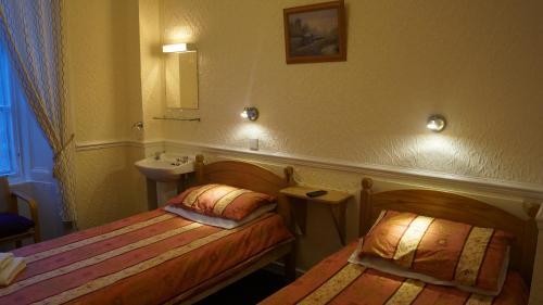 Foto de una habitación de Hampton Court Guesthouse