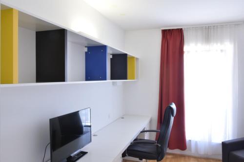 Foto de una habitación de Albergue Rooms Kampus
