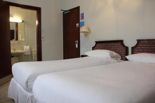Foto de una habitación de Centennial Hotel
