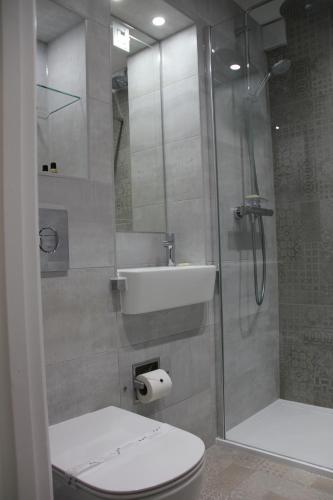 Foto del baño de Centennial Hotel