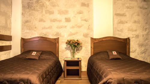 Foto de una habitación de Hotel El Portal De San Lázaro