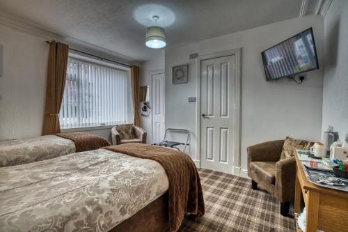 Foto de una habitación de Pitfaranne Guest House