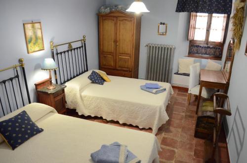 Foto de una habitación de Casa Rural La Pequeña A y B