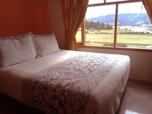 Foto de una habitación de Hotel Cabañas San Cayetano