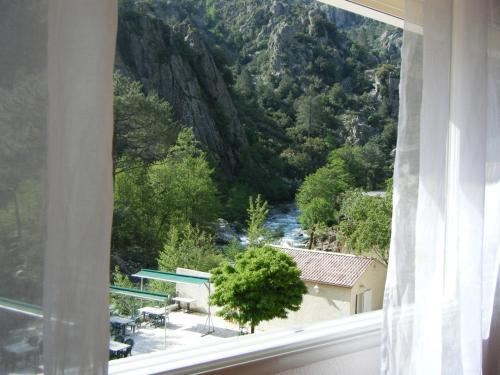 Foto de una habitación de Hotel Arena restaurant le Refuge
