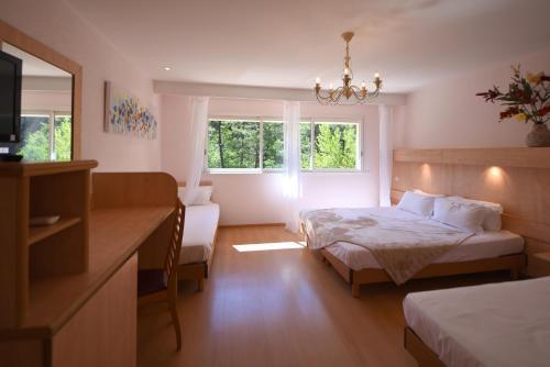 Foto de una habitación de Hotel Arena restaurant le Refuge