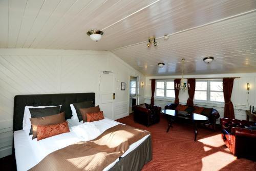 Foto de una habitación de Kronen Gaard Hotel