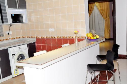 Photo – Aparthotel Tooq Suites