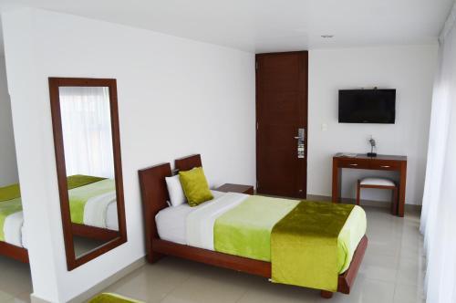 Foto de una habitación de Cariongo Plaza Hotel