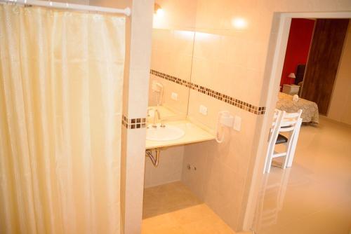 Foto de una habitación de Hotel Encanto Del Mar