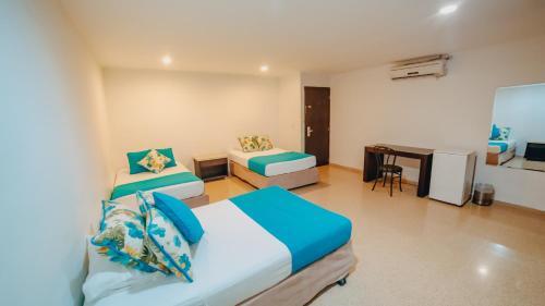 Foto de una habitación de Hotel La Iguana de Santa fe De Antioquia