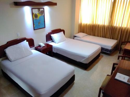 Foto de una habitación de Hotel Maria Gloria