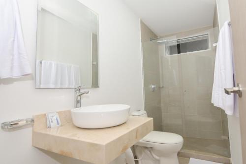 Foto de una habitación de Hotel OR Suites