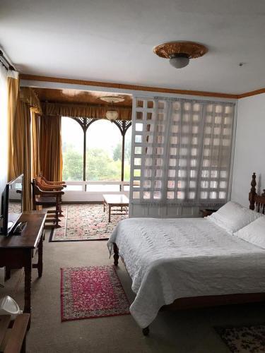 Foto de una habitación de Hotel Puntalarga
