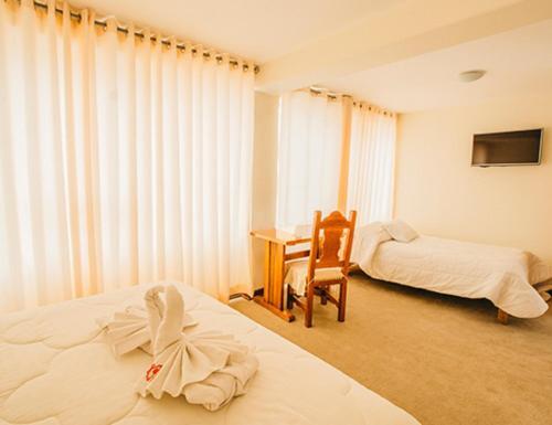 Foto de una habitación de Hotel El Buho
