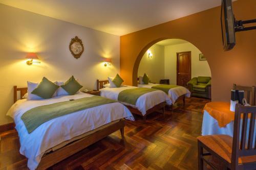 Foto de una habitación de Hotel El Virrey Boutique