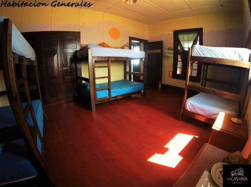 Foto de una habitación de Albergue La Casona de Lobitos